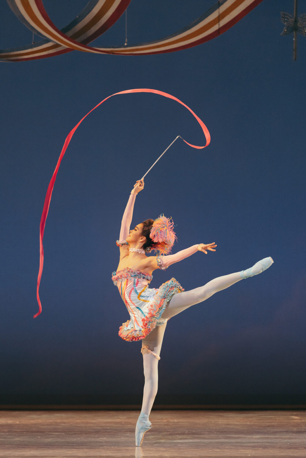 french en point arabeque with the ribbon twirling in the air