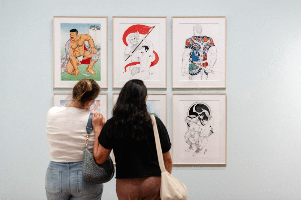 2 women browse the work of Tagame Gengoroh