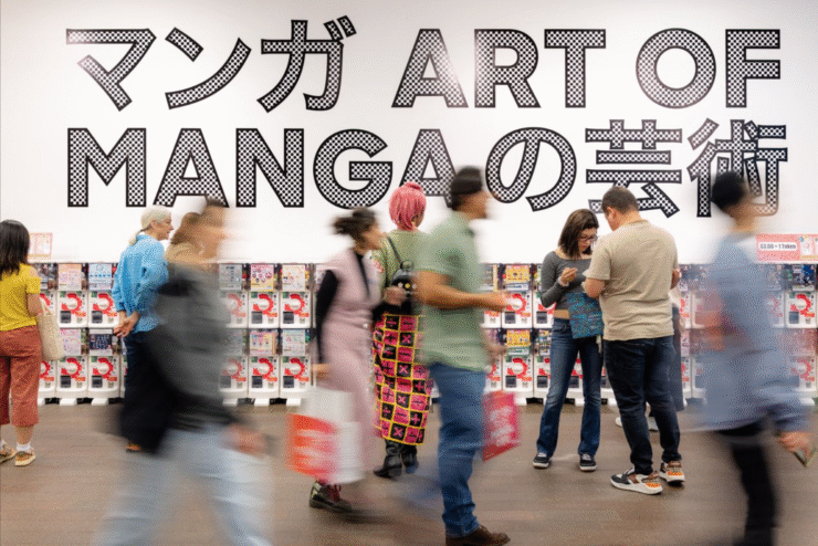 motion blue of the crowd walking past the toy machines