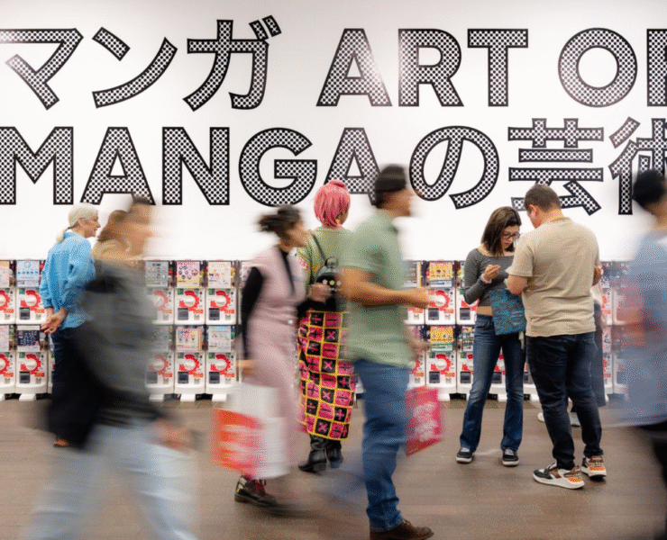 motion blue of the crowd walking past the toy machines