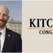 Derek Kitchen beside his congress logo