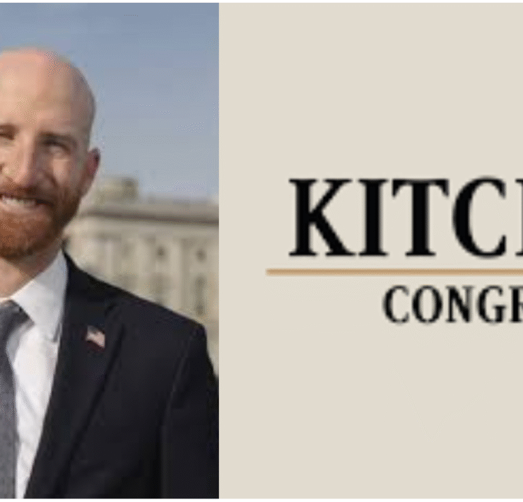 Derek Kitchen beside his congress logo